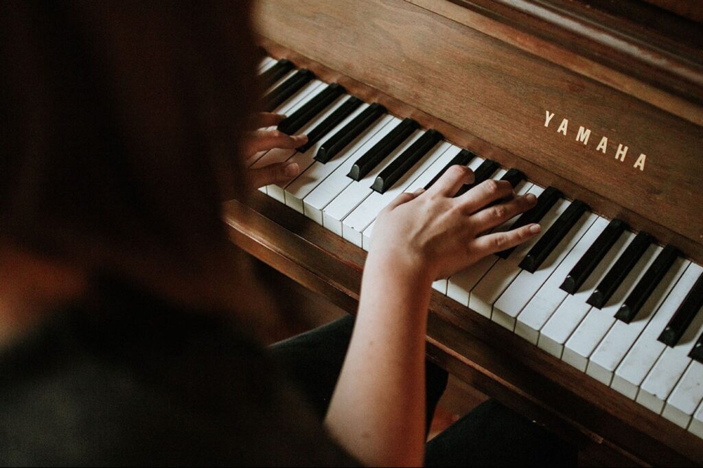 These Piano Lessons Could Help Your Workers Decompress