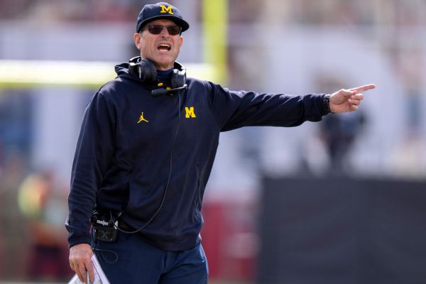 Sources: NCAA investigating Michigan, Harbaugh