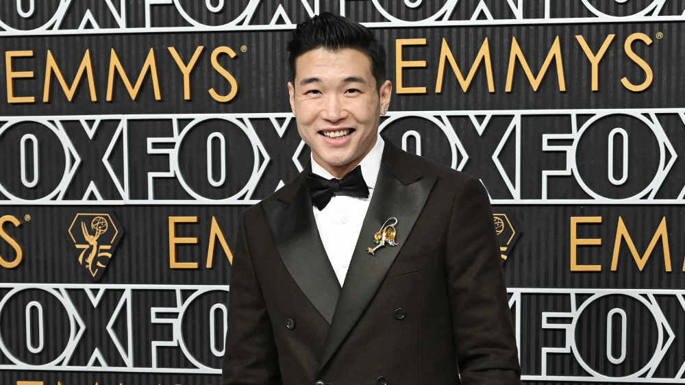 Joel Kim Booster on Limiting the Amount of Gay Best Friend Roles and ‘Derailing’ Dinner Parties With Chrissy Teigen