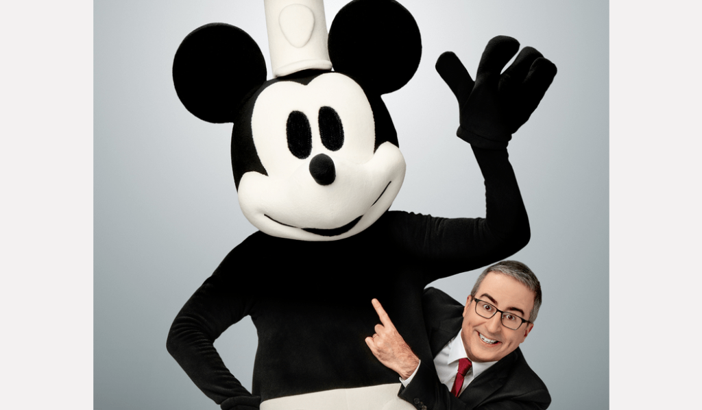 Jon Oliver Trolls Disney With Steamboat Willie Promo: ‘What Are They Gonna Do, Sue?’