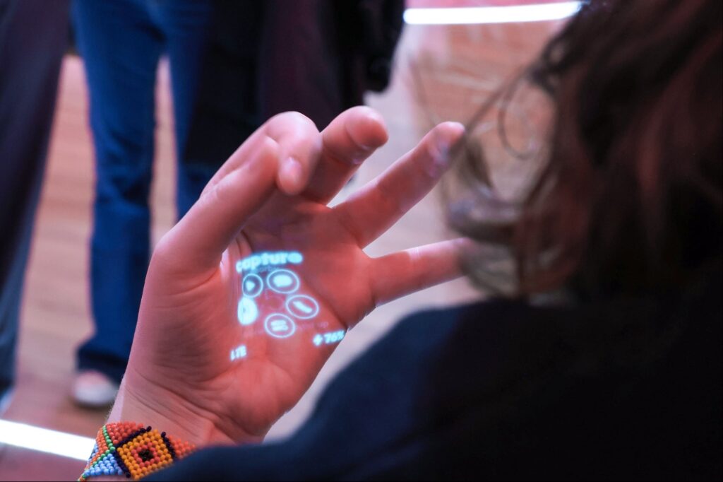 This Futuristic Wearable Smartphone Alternative Projects a Screen Into Your Palm — And It’s Now Widely Available