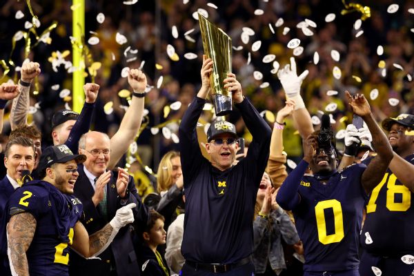 Harbaugh gets ’15-0′ tattoo for Michigan’s title