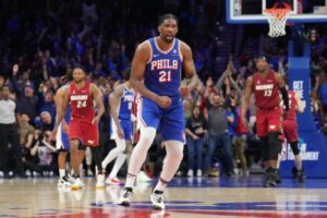 Embiid keys rally as Sixers top Heat for 7-seed